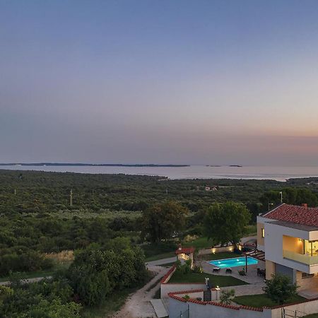 Villa White Barbariga Exterior photo