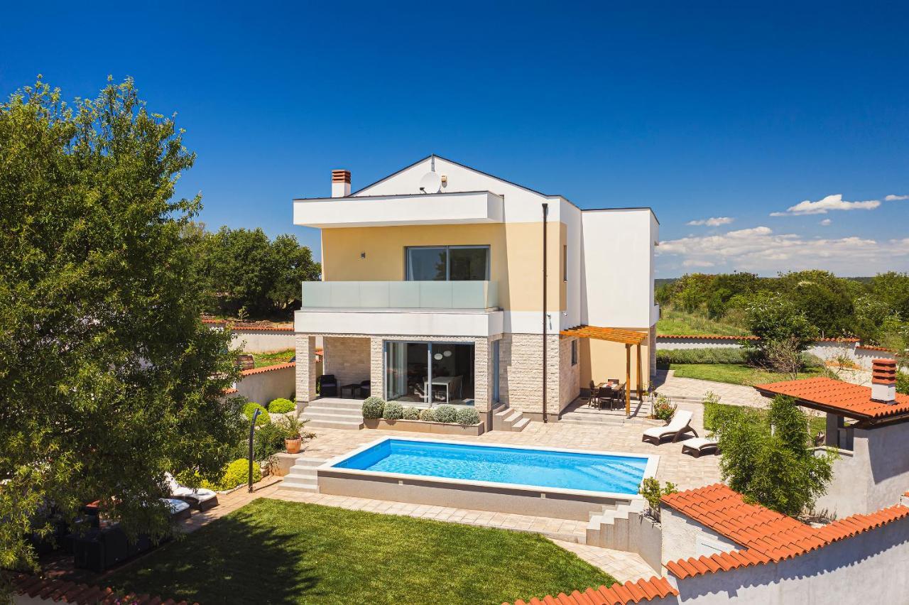 Villa White Barbariga Exterior photo