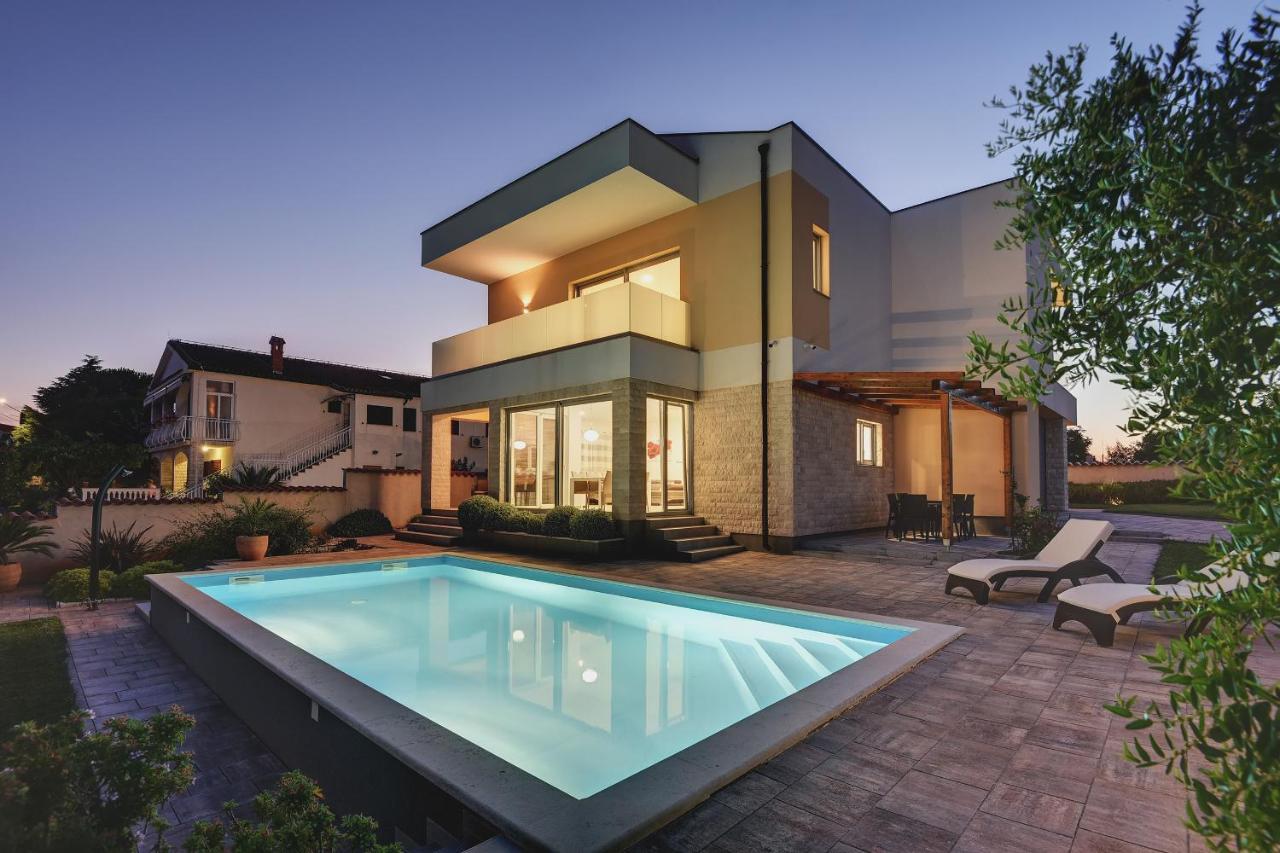 Villa White Barbariga Exterior photo