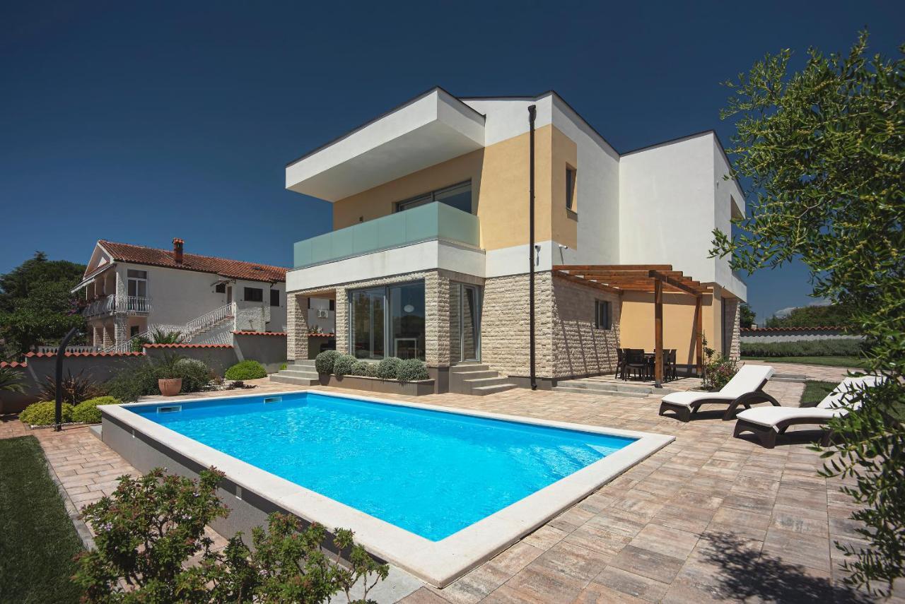 Villa White Barbariga Exterior photo