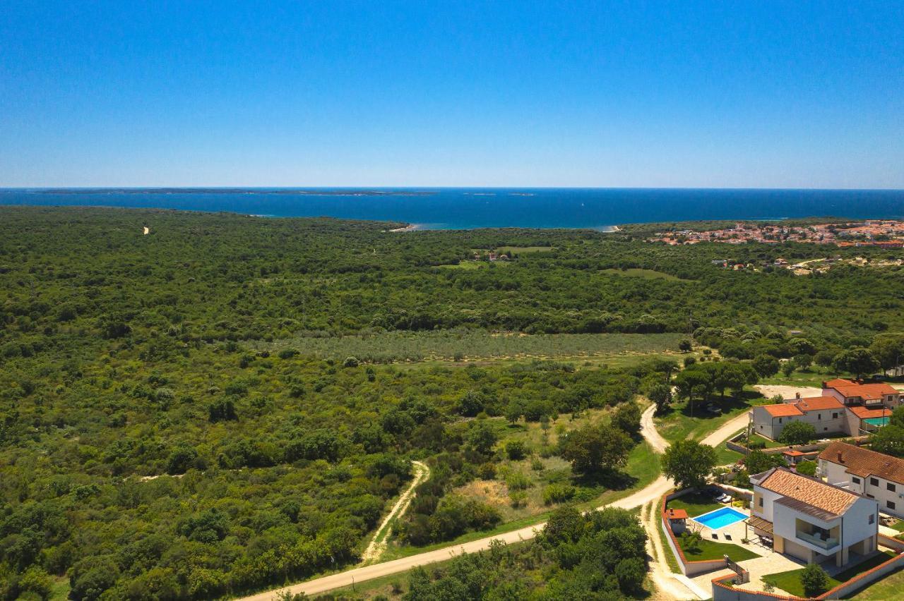 Villa White Barbariga Exterior photo