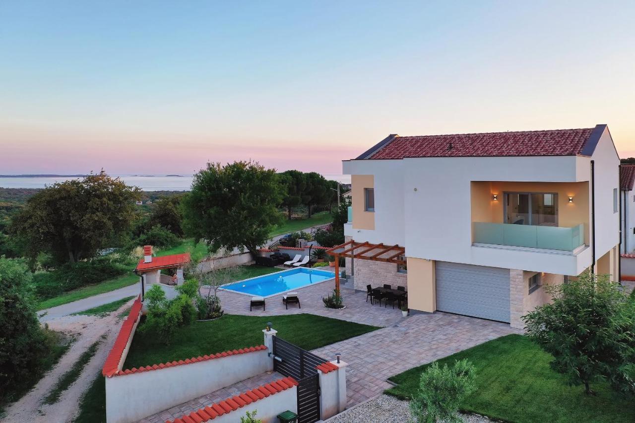 Villa White Barbariga Exterior photo