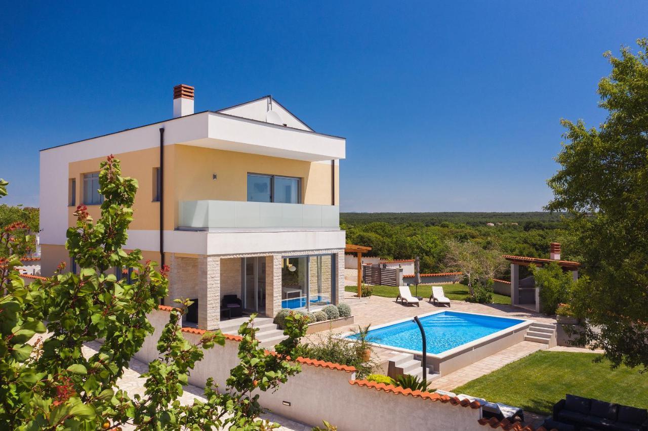 Villa White Barbariga Exterior photo